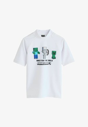 Fehér rövid ujjú ing Minecraft karakterekkel — zombi, íjas csontváz és creeper — és a szöveg: "Csak a bátor Minecraft számára."
