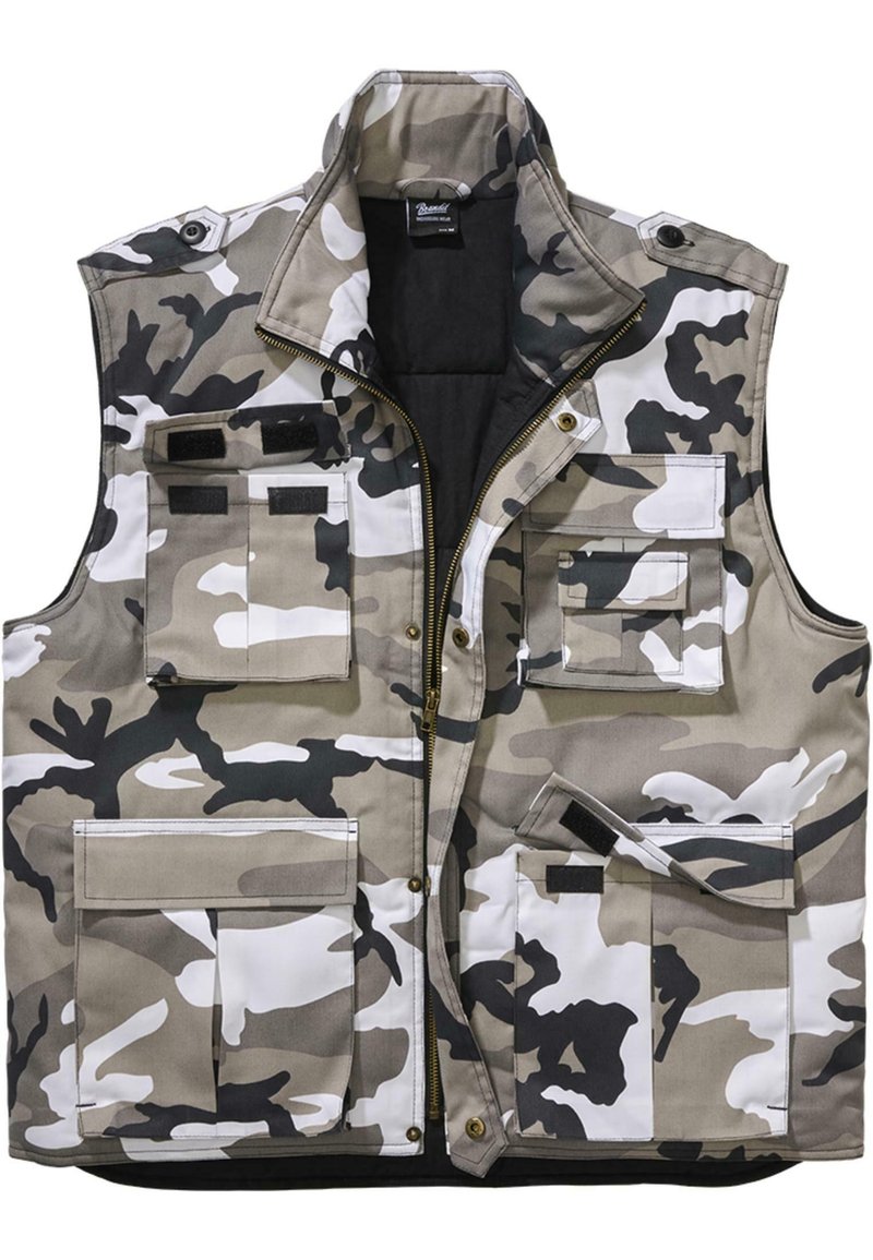 Chaleco de camuflaje en tonos de beige, gris y negro; cuenta con múltiples bolsillos frontales, un cierre con cremallera y un cuello alto. Tejido texturizado.
