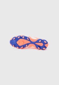 Bright orange football boot sole with blue cleats, viewed from the bottom on a plain light background.