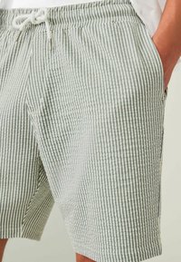 Next SEERSUCKER STRIPED  - REGULAR FIT - Tepláky - sage green