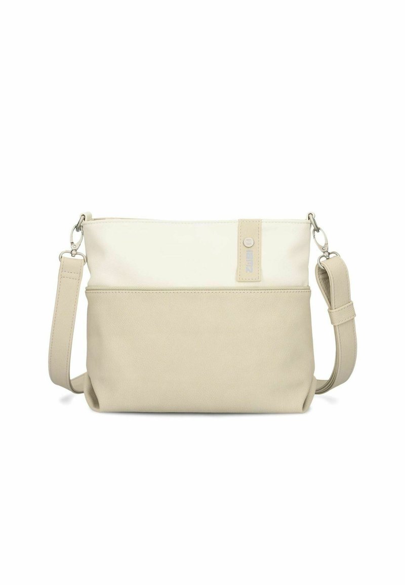 Bolso cruzado beige con un acabado suave, que presenta una sección superior blanca, correa ajustable y una pestaña con un detalle del logo.
