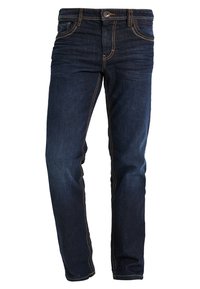 Donkerblauwe denim jeans met contrasterende oranje stiksels, vijf-pocket design en een ritssluiting met knoopsluiting. Slank model.