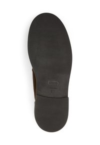 Semelle de chaussure marron avec une surface en caoutchouc noir texturé, forme arrondie et profil plat ; comprend des marquages de taille et de pays de fabrication.