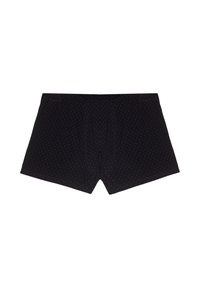 Calzoncillos ajustados para hombres de color negro con pequeños lunares rojos, cinturilla elástica y funda contorneada sobre un fondo blanco.