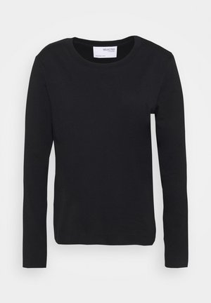 Svart långärmad t-shirt i mjukt bomullsmaterial, med rundad halsringning och en enkel, sömlös design utan mönster eller accenter.