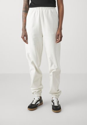 NJOLA - Pantalones deportivos - open white