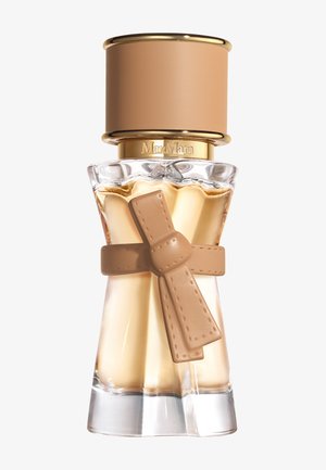 Flacon de parfum en verre clair en forme de robe avec un détail de nœud beige et un grand bouchon beige avec un accent doré gravé Max Mara.