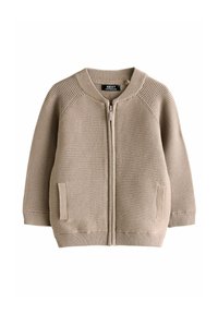 Maglione beige con zip, struttura a coste, collo rotondo e tasche laterali. Presenta un colore uniforme e materiale morbido in cotone.