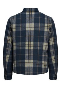 Námořnický modrý a zelený kostkovaný kabát s dlouhými rukávy, límcem a zapínáním na knoflíky. Vyrobený z texturované látky s kontrastními vzory.