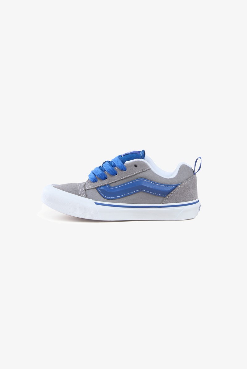 Grey canvas shoe with blue laces, white rubber sole, and a blue side stripe design. Features a pull tab at the heel for easy wear.