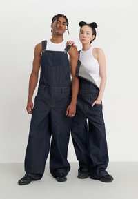 YOURTURN by Zalando - UNISEX - Baggy Jeans - raw denim Thumbnail Image 1