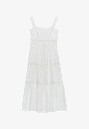 Vit klänning med fyrkantig halsringning, tjocka remmar och broderade blommönster. Har en lager på lager-kjol och spetsdetaljer.