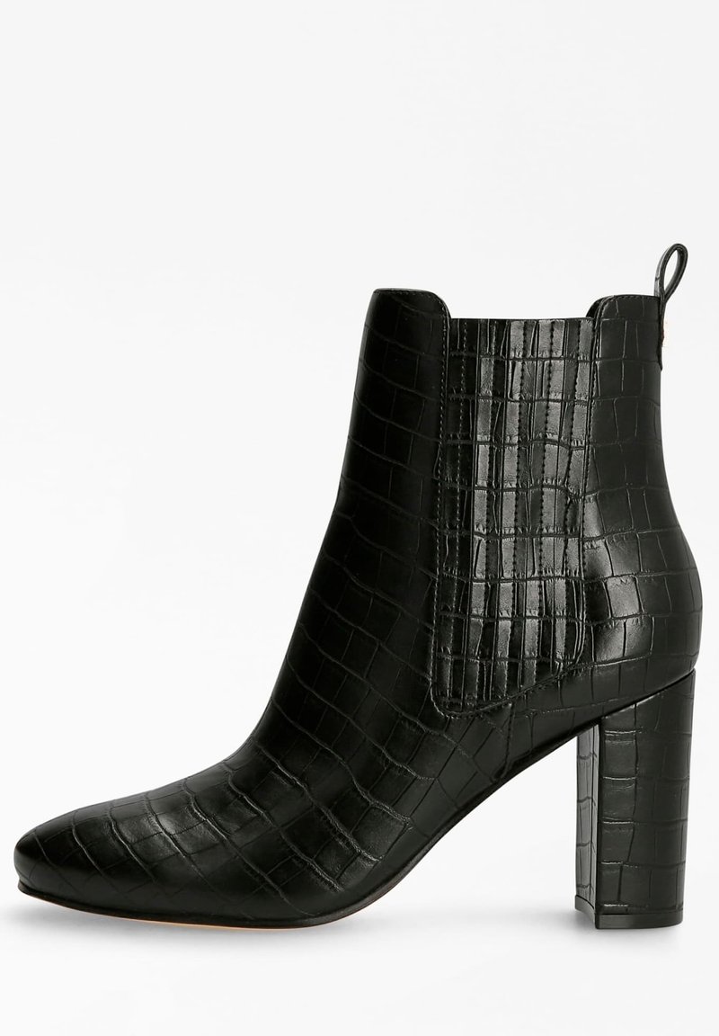 Black ankle boot with a faux crocodile texture, pointed toe, and a chunky heel. Features elastic sides and a pull tab at the back.