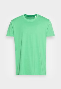T-shirt verde menta a maniche corte realizzato in tessuto morbido. Vestibilità regolare con scollatura a girocollo e senza motivi visibili o accenti.