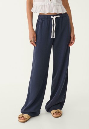 LOOSE-FITTING - Hlače - mottled dark blue