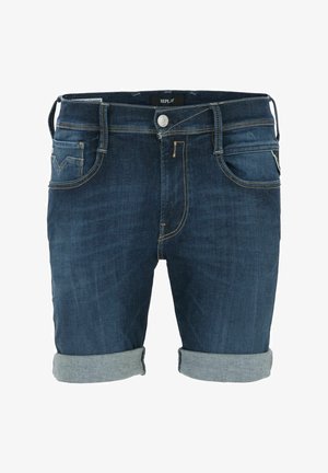 Shorts en jean de couleur bleu foncé avec un ourlet retroussé, dotés de cinq poches et de coutures contrastées claires. Étiquette de marque visible sur la taille.