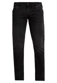 Schwarze Jeans aus Denim mit schlanker Passform, ausgestattet mit fünf Taschen, einem Knopfverschluss und subtilen Verblassungen. Glatte Textur mit minimalen Nähten.