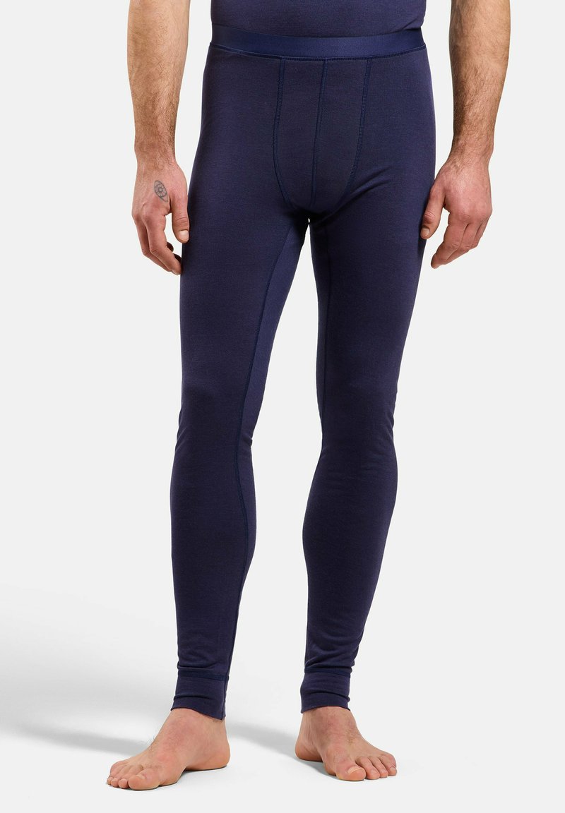Marinefarbene thermische Leggings aus einem glatten, dehnbaren Stoff. Sie verfügen über ein figurbetontes Design, einen elastischen Bund und enganliegende Bündchen an den Knöcheln.