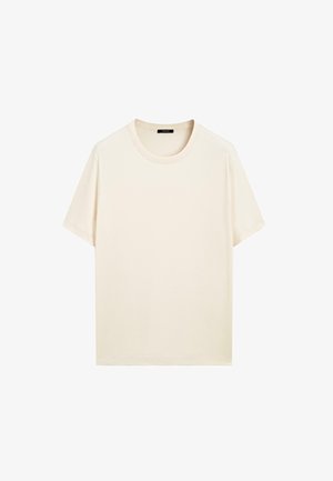 T-shirt met korte mouwen in off-white, gemaakt van zacht katoen met een ronde hals en een relaxte pasvorm. Minimalistisch ontwerp, geen zichtbare patronen of accenten.