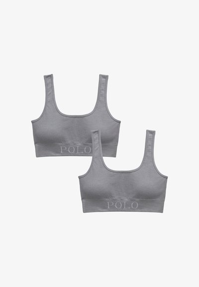 Ljusgrå, ribbad bralette i tyg med breda axelband och fyrkantig halsringning. Har subtil "POLO"-text på banden. Set i två delar.