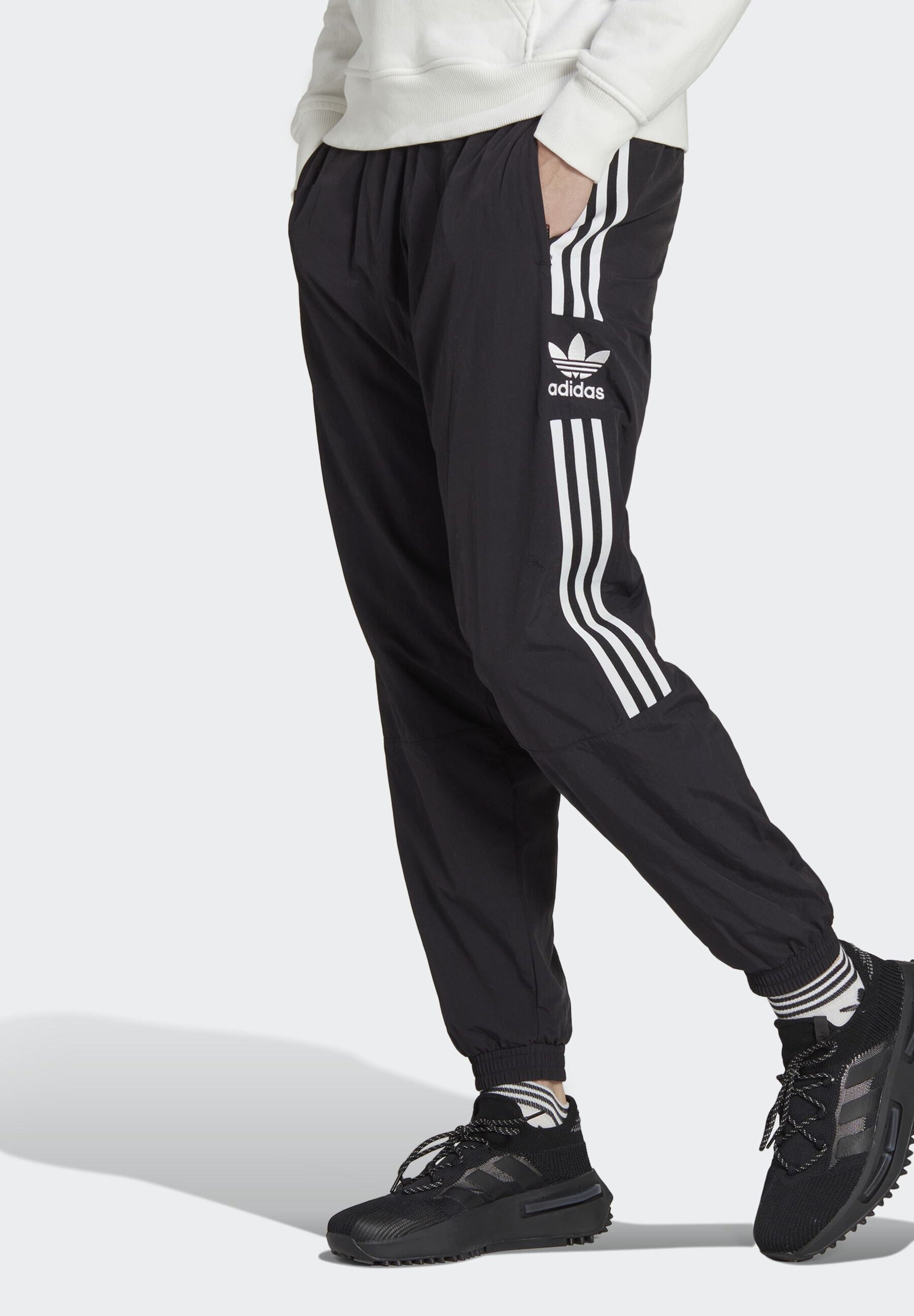 - UP adidas LOCK - Originals TP Jogginghose black/schwarz