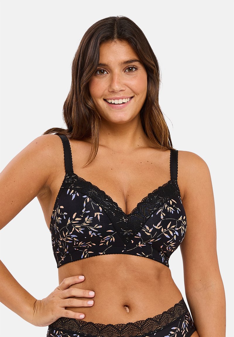 Zwarte bralette met bloemenpatroon, kantafwerking en verstelbare bandjes. Zachte stof; heeft een V-halsontwerp en subtiele bladzijdenaccenten.