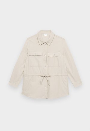 Light beige button-up jacket with long sleeves, two chest pockets, and a drawstring waist for adjustable fit. Smooth fabric texture, classic collar.