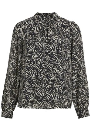 Langermet bluse i lett, mønstret stoff med et abstrakt bølgedesign i svart og krem, høy hals og samlede skul seams.