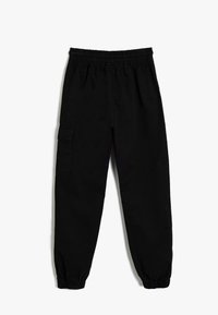 Pantaloni cargo neri con una cintura elastica, polsini elasticizzati e una tasca laterale. Realizzati in un tessuto morbido e resistente.