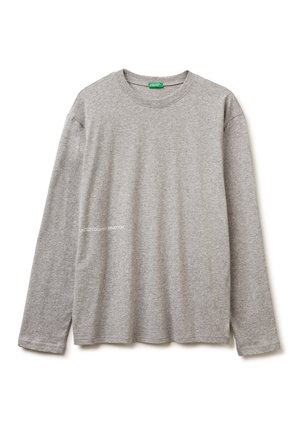 Gray long-sleeve t-shirt made of soft cotton material. Features a crew neckline and subtle white logo text on the side.