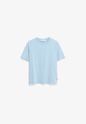 Light blue cotton t-shirt with short sleeves, round neckline, and a relaxed fit. Features a label at the hem. Smooth texture, minimal design.