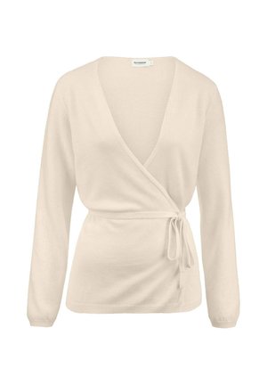 Cream-colored long-sleeve wrap sweater with V-neck and side tie belt, featuring ribbed cuffs and hem.