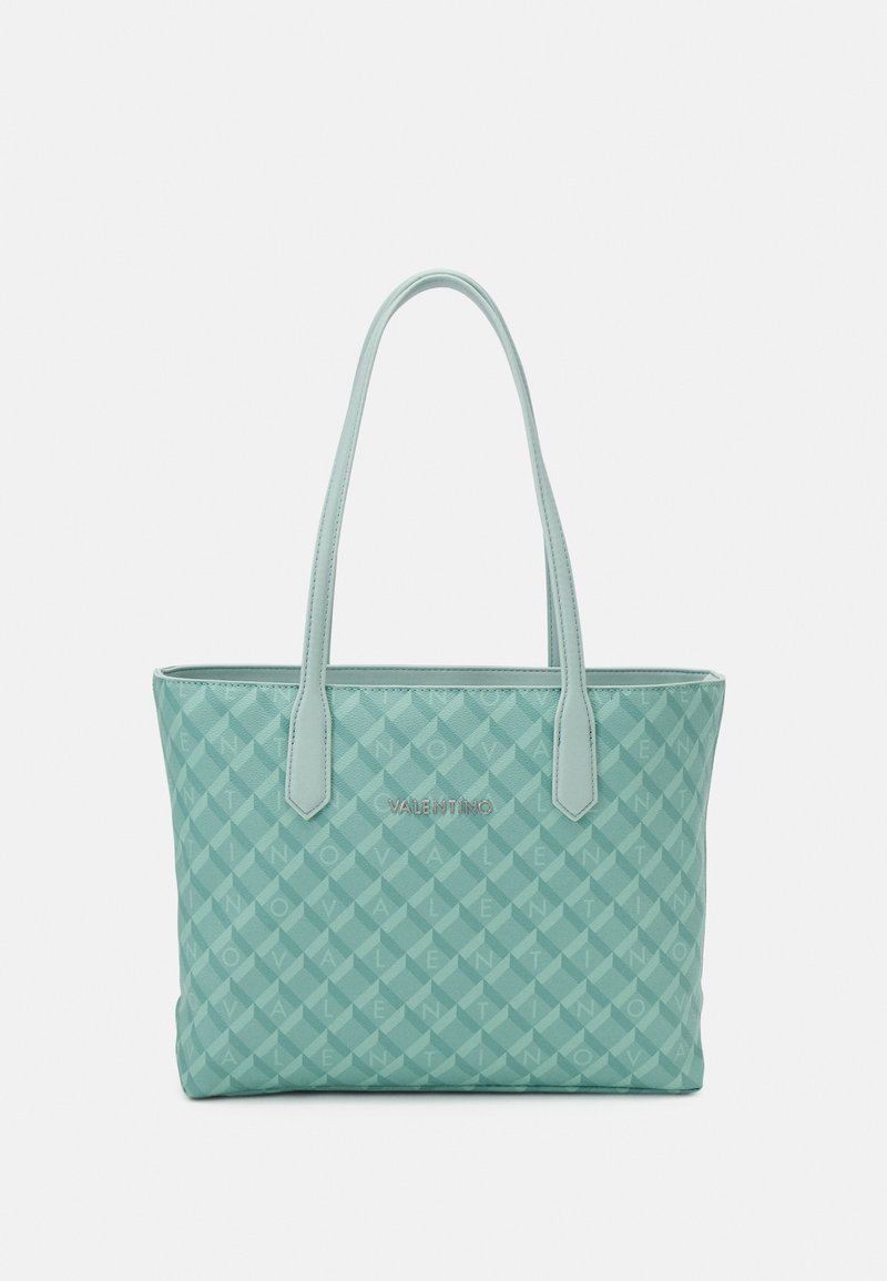 Light teal tote bag with quilted pattern, faux leather material, dual top handles, and silver "VALENTINO" logo on the front.