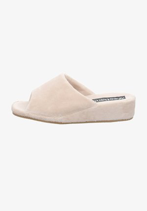 Beige plush slip-on slippers with an open toe design. Soft texture, padded midsole, and a flat rubber outsole.