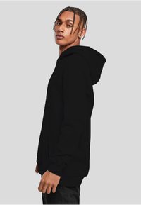 Mister Tee ABSOLUTELY NOT - Jersey con capucha - black