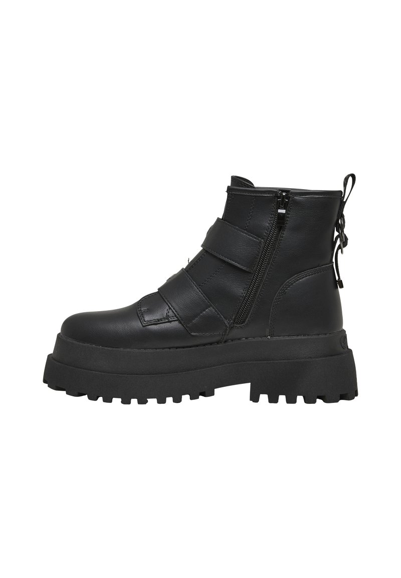 Bottes cheville en cuir noir avec semelle en caoutchouc épaisse, dotées de deux fermetures éclair et de sangles ajustables sur le médio-pied. Accents texturés inclus.