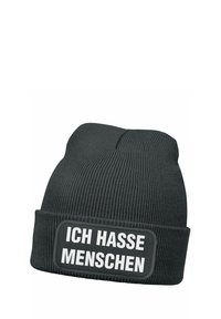 Black knitted beanie with a textured pattern and a prominent rectangular patch featuring the white text "ICH HASSE MENSCHEN."