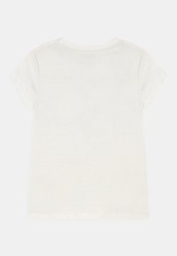 Koszulka z krótkim rękawem w kolorze off-white, z okrągłym dekoltem oraz gładkim, lekkim materiałem o subtelnej teksturze. Prosty design na plecach.