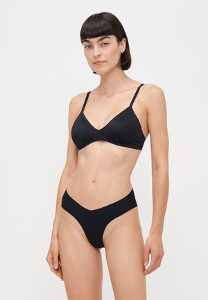 Black bikini set featuring a triangular bralette with thin straps and a low-rise bottom. Smooth, stretchy fabric with a minimal design.