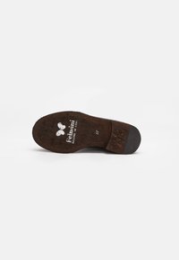 Brown leather shoe sole featuring a textured surface, a slight heel, and embossed branding. Size marked as 37.