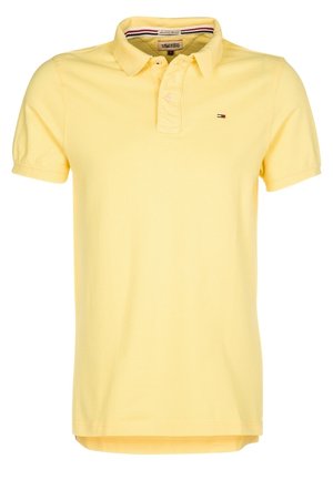 Polohemd aus weichem, gelbem Baumwollstoff mit klassischem Kragen, kurzen Ärmeln und kleinem Logo auf der Brust. Hat einen geraden Saum.