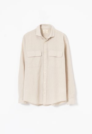 PuroEgo, Camisa - piedra