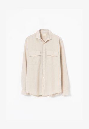PuroEgo, Camisa - piedra