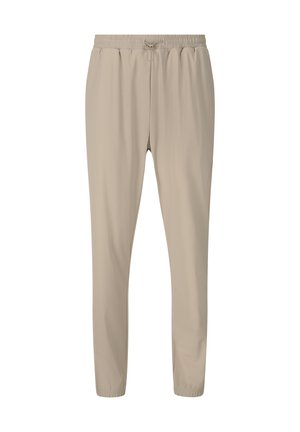 Pantalon de jogging beige avec taille élastique, cordon de serrage et poignets élastiques, vu de face sur fond blanc.