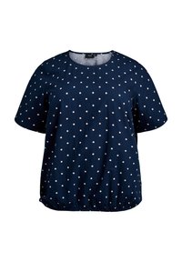 Maglietta blu navy a maniche corte con pois bianchi, scollatura rotonda e orlo elastico per un effetto arricciato. Realizzata in un tessuto leggero.