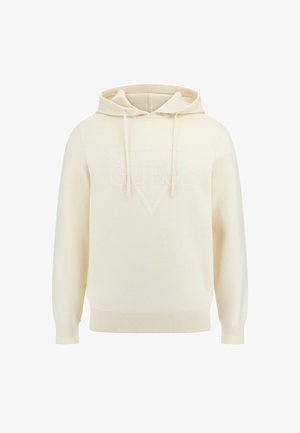 Cream-colored hooded sweatshirt made of soft fabric, featuring an embossed white "GUESS" logo and ribbed cuffs and hem.
