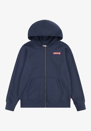Marineblå hættetrøje med lynlås, forlommer og Levi’s-logo i rød og hvid på brystet. Hættetrøje med lange ærmer.