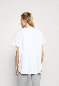 Nike Performance ONE LUXE - T-shirt desportiva - white