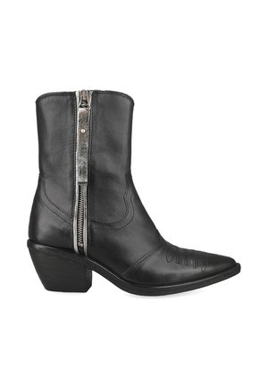 Black leather ankle boot with pointed toe, low block heel, decorative stitching, and silver side zipper with pull tab.