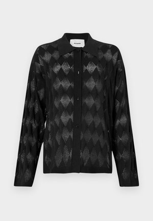 Cardigan nero con un motivo a rombi, maniche lunghe e chiusura con bottoni. Realizzato in materiale knit leggero con una texture morbida.